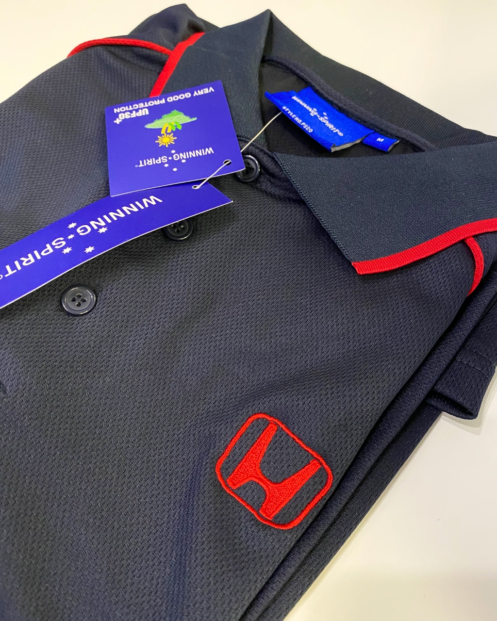 Honda logo embroidery on polo shirt